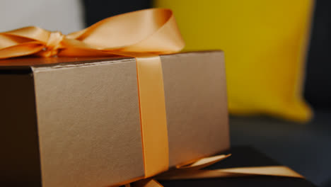 Close-Up-Of-Gift-Wrapped-Presents-On-Table-In-Lounge-At-Home-3